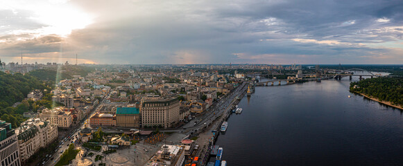 Panoramic view of Kyiv city with a beautiful rainbow over the city. Aerial view of the Arch of Friendship of Peoples.