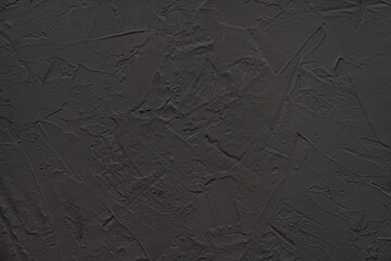 Abstract banner gray black background - in the form of a concrete rough surface, close-up. 