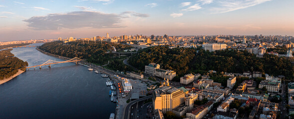 Obraz premium Beautiful sunset over Kyiv city from above. Magical city center view.