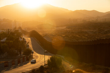 Tecate, Baja California, Mexico - September 14, 2021: Late afternoon sun shines on the USA Mexico...
