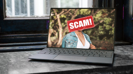 A romance scam concept. A fake social media photo or dating profile using a stolen image of a woman displayed on a laptop screen. - obrazy, fototapety, plakaty