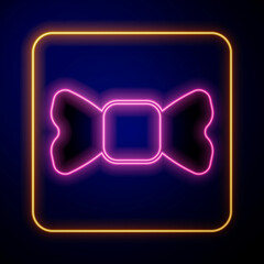 Glowing neon Bow tie icon isolated on black background. Vector
