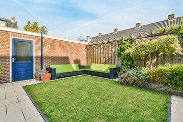 A delightful courtyard with a freshly mown lawn