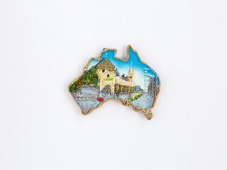 Fridge magnet in form of Australia country with decorative inscription Melbourn isolated on white...
