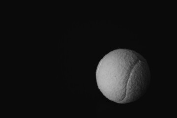 Isolated Tennis Ball on Black Background 