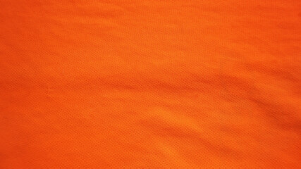 A bright orange fabric texture in the center for backgrounds or other design illustrations and artwork.