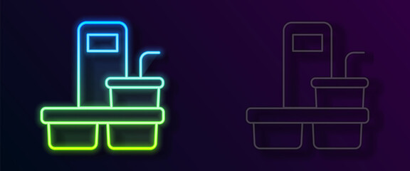 Glowing neon line Coffee cup to go icon isolated on black background. Vector
