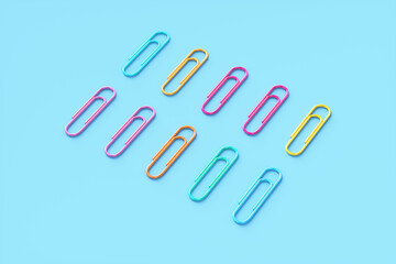 Pop art paper clips on a blue background. 3d rendering illustration.