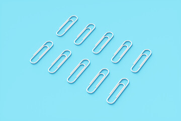 Pop art paper clips on a blue background. 3d rendering illustration.