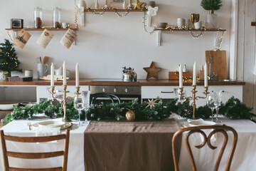 New Year's table setting. Waiting for Christmas. Kitchen interior with decoration. 