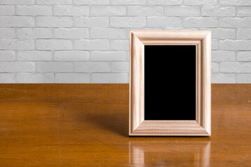 old photo frame on the wooden table