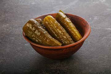 Marinated pickled cucumbers in the bowl