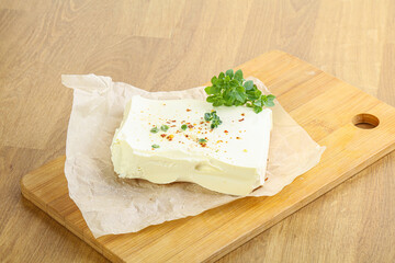 Greek Feta cheese over board