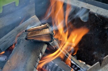 firewood for kindling in the grill or stove was set on fire, a small fire