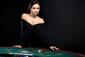 sexy woman with poker cards and chips