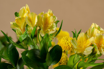 Beautiful yellow and green Bouquet of lilies and chrysanthemums