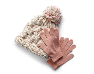 Warm hat and gloves on white background