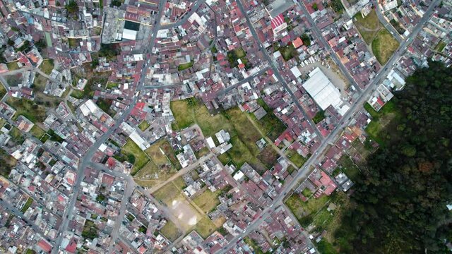 Drone Aerial Top Down View Of Urban Colonial Neighborhood Buildings And Streets In Quetzaltenango Xela Guatemala.