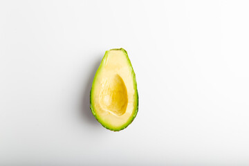 Minimal view of half an avocado.