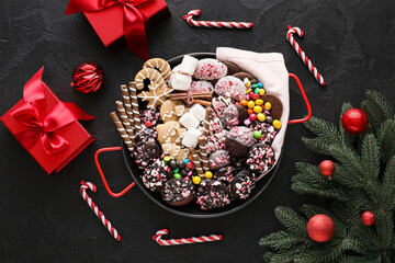 Different Christmas cookies on table