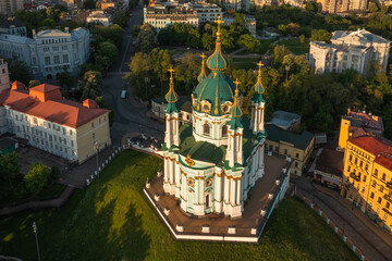 Aerial view of St. Andrew's Church and St. Andrew's Street is one of the most important sights of the city of Kiev. City landscape of the Podolsk region. Tourism, recreation, vacation.