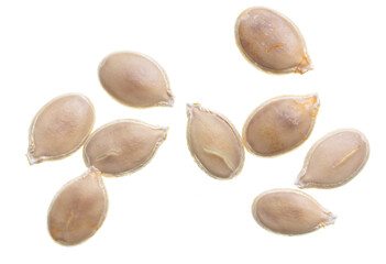 Close-up of pumpkin seeds on a white background.