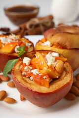 Concept of tasty food with baked apple, close up