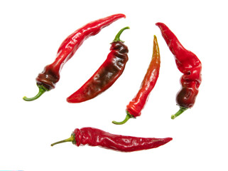 Red chili peppers isolated over white background. Close-up