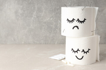 Concept of healthcare with hemorrhoids accessories on light textured table