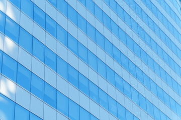 Modern architecture in blue tone,Windows on Skyscrapers,reflection on the glass