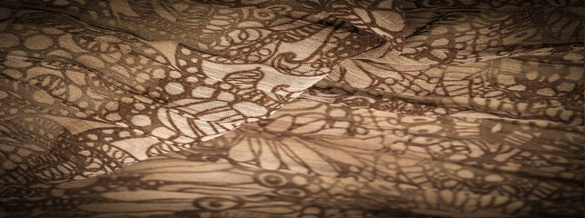Background texture, decorative ornament, brown-beige silk fabric, floral pattern, corrugation, reef, undulation, undulation, ripples, a small wave or a series of waves on the surface of the fabric