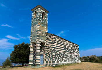View of the famous Church of San Michele de Murato, a small chapel in polychrome stones and typical...