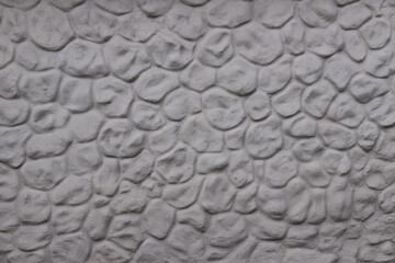The texture of the concrete fence for the stylization of stones