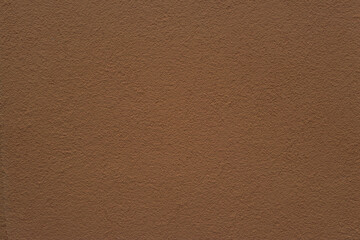 Brown facade plaster. Wall. Background