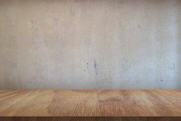 Wooden board empty table in front of concrete background 