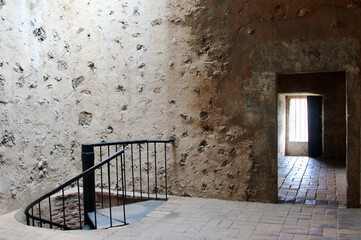 Stone Wall with spiral staircase and doorway in the fort in Santo Domingo, Dominican Republic