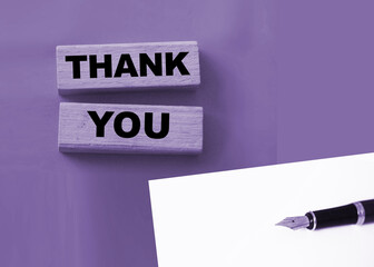 Text THANK YOU letters on the wooden blocks. Gratitude concept