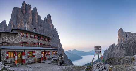 panorama view from the top of the mountain of pale di san martino in the dolomites with pradidali...