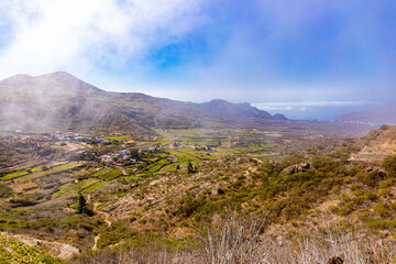 Fototapeta premium Plains view in Teide National Park with clouds, Tenerife