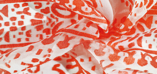 Texture, pattern, collection, silk fabric, women's scarf, red ruby pastel on a beige background