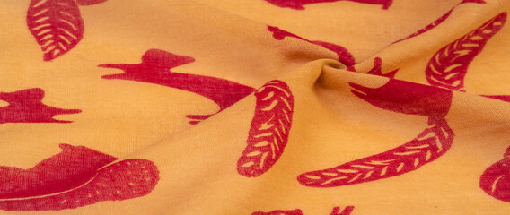 Texture, background, cotton fabric thin yellow with a print of squirrels, martens, sables. Pattern,...