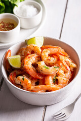 Delicious sea food, grilled shrimps with lemon