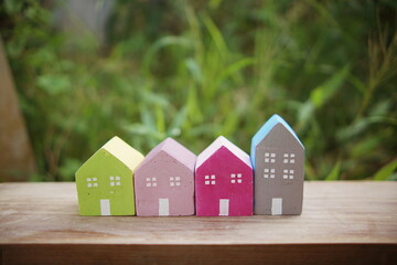 Colorful Miniature little houses village Home  and Real Estate concept