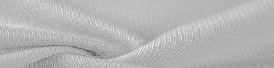 Background, texture, pattern, white wool fabric, thin soft curly or wavy hair forming the hair of a sheep, goat or similar animal, especially when used in the manufacture of fabric or yarn. - obrazy, fototapety, plakaty