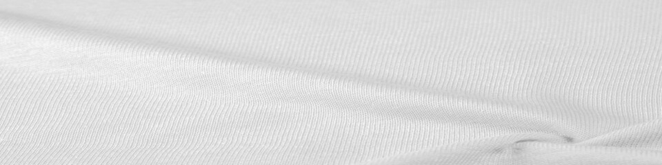 Background, texture, pattern, white wool fabric, thin soft curly or wavy hair forming the hair of a sheep, goat or similar animal, especially when used in the manufacture of fabric or yarn.