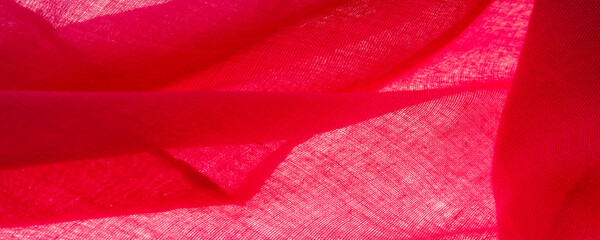Texture.Background. fabric silk red matte of a color, (paint, or surface) dull and flat, without a shine.