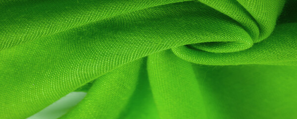 Texture. Background fabric of silk green matte color, (paint or surface) is dull and flat, without...
