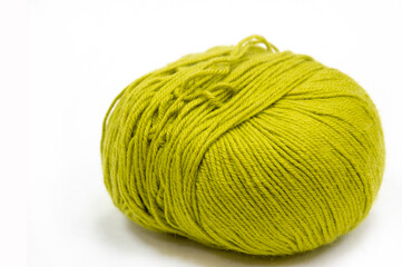 Sewing products. Roll of green wool yarn. This yarn has a great color and is suitable for crocheting, knitting and braiding.