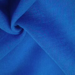 Texture. Background fabric of silk blue matte color, (paint or surface) is dull and flat, without...