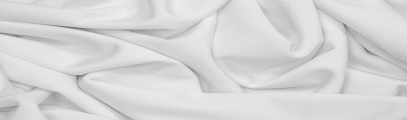 White silk fabric. Texture. Background. Pattern. Dupioni silk fabric has a shiny sheen and characteristic small folds that run horizontally. She lies down in soft folds - obrazy, fototapety, plakaty